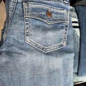 Two pair of rock revival in several pair of BKE brand jeans size 28